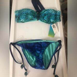 NWT. 2 piece swimsuit.  Size 10. LUXE By Lisa Vogel.